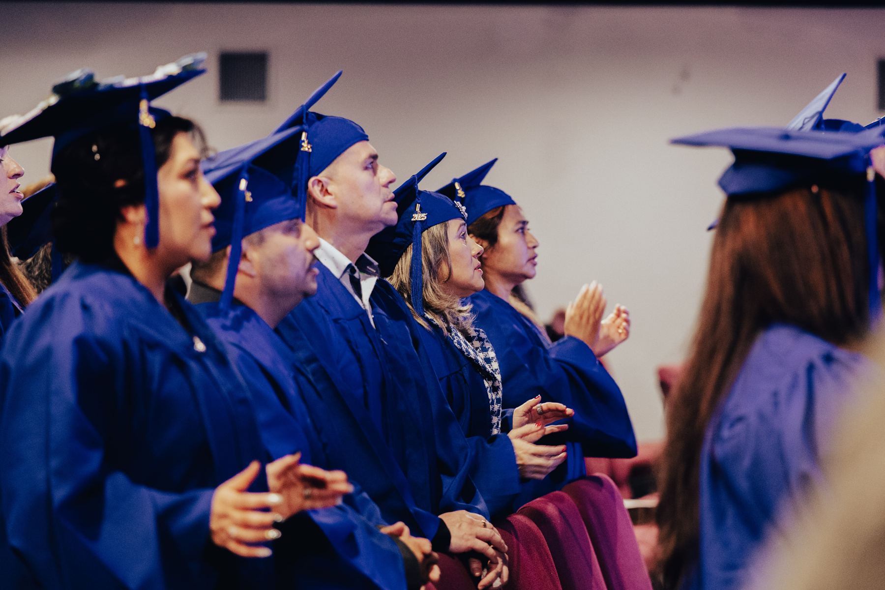 Living Word Bible Academy graduates in gowns
